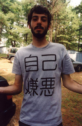 Illustration for article titled Foreigners in Stupid Japanese T-Shirts
